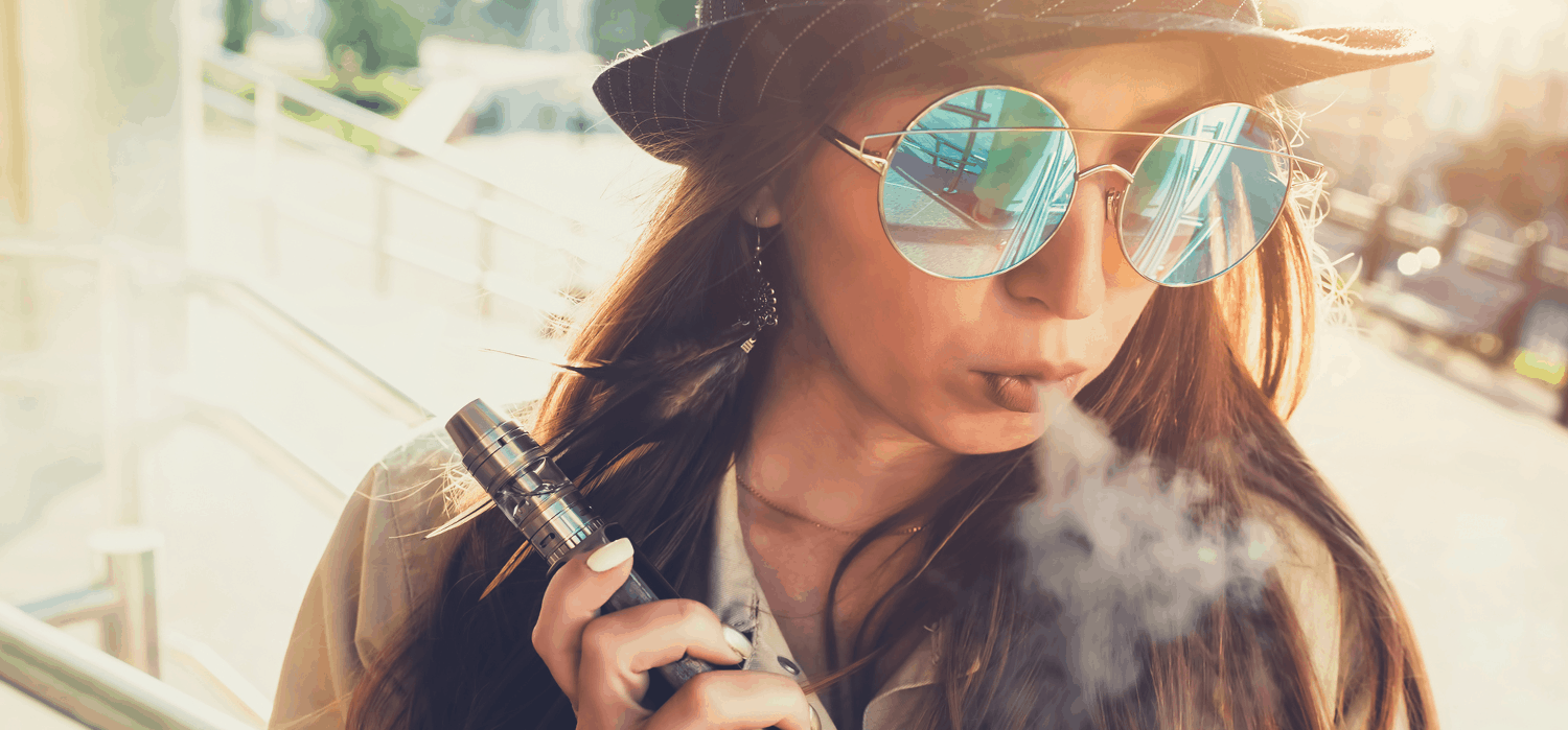 Young teen girl vaping